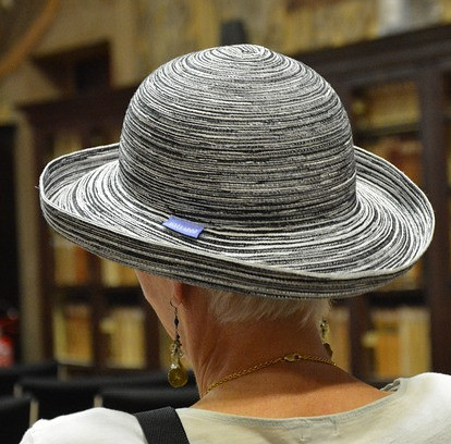 Gray Black and White Hat on Woman with Short Hair in Bookstore
